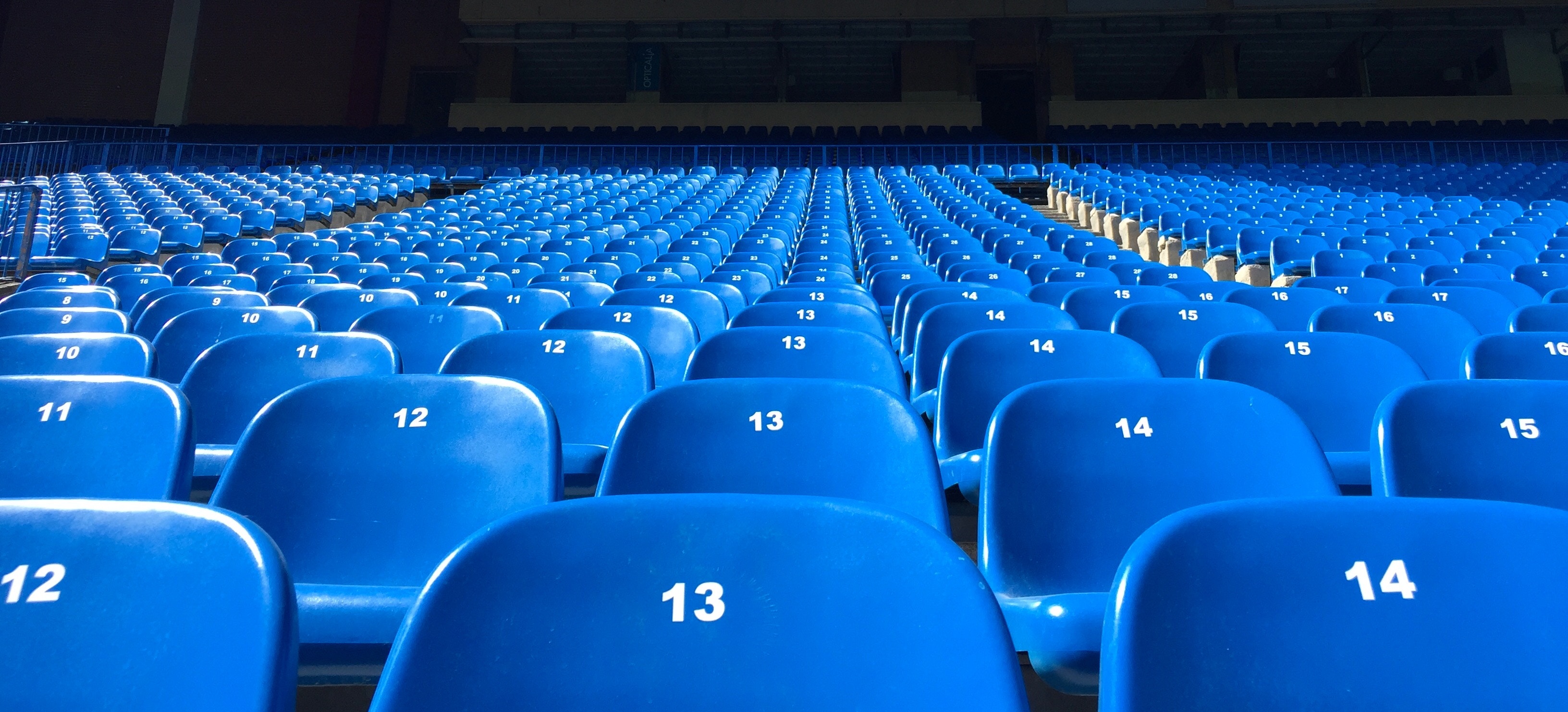 Column and Row Empty Seats Photo by Florian Müller on Unsplash